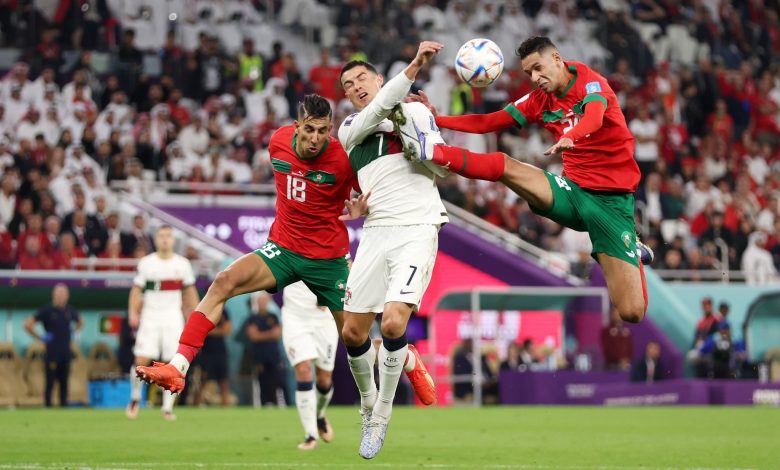 بدر بانون و جواد الياميق وكريستيانو رونالدو من مباراة المغرب والبرتغال في كأس العالم 2022
